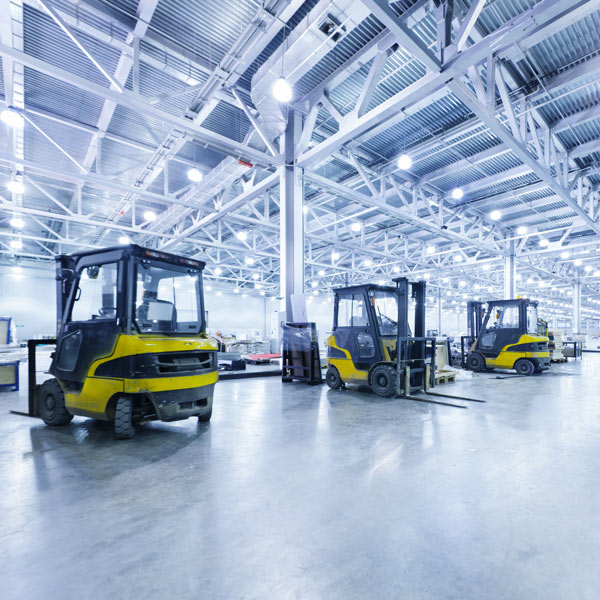 idle forklifts in warehouse